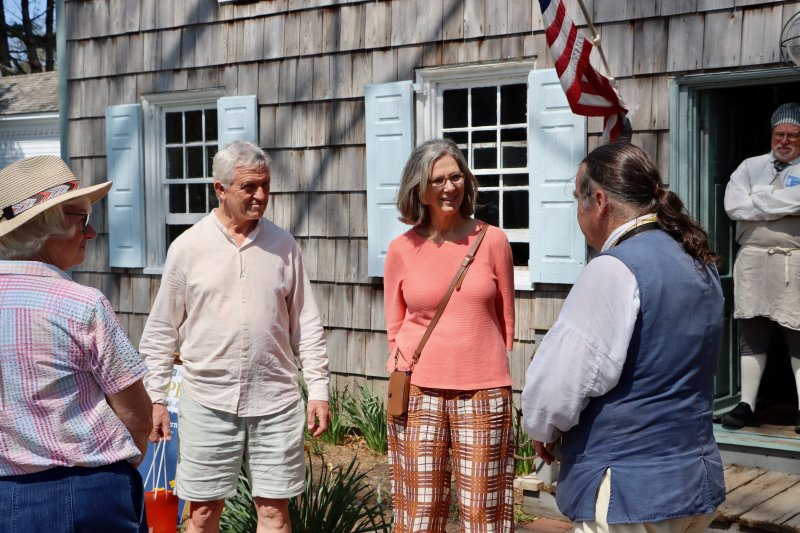Netherlands Ambassador Birgitta Tazelaar and her husband Mark Singleton learn about Lewes history during a visit to the Historic Lewes Shipcarpenter Campus. Shown are (l-r) Liz Clements, Lewes in Bloom co-chair; Singleton; Tazelaar; and Bill Hicks of Historic Lewes.